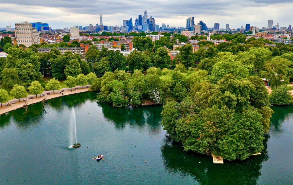 Clissold Park in London with boating lake and fountain